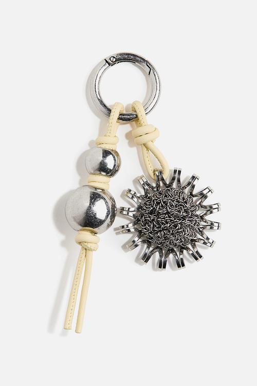 H&M Studio: Sunburst bag charm - silver-coloured/sunburst