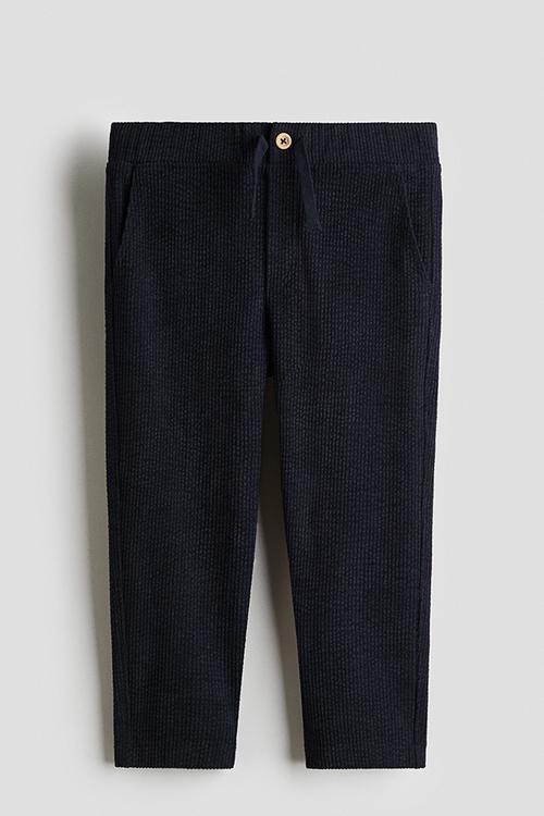 Ribbed velour trousers - navy blue