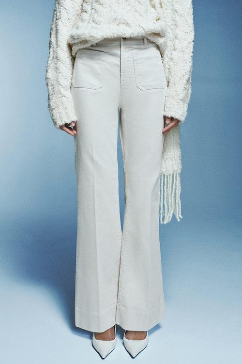 Flared corduroy trousers - light beige