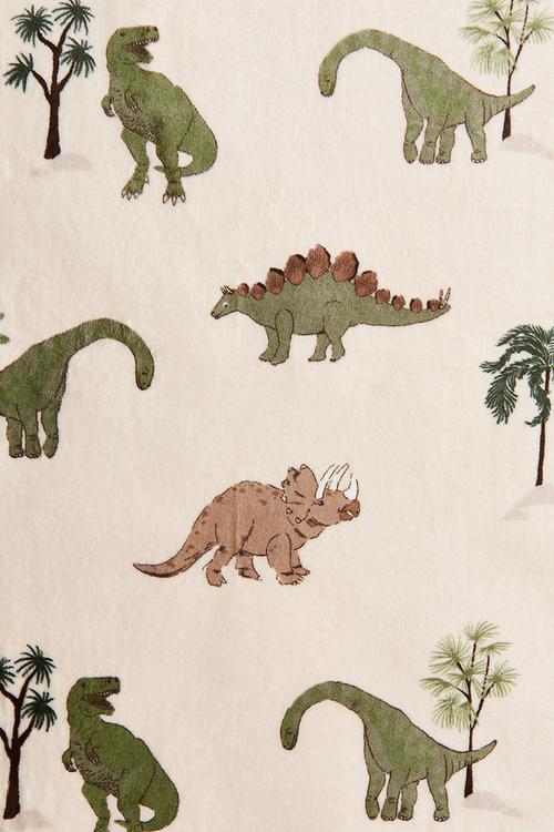 Patterned fleece blanket - light beige/dinosaurs