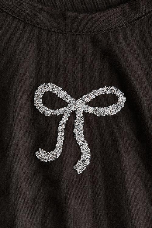 Motif-detail cotton top - black/bow