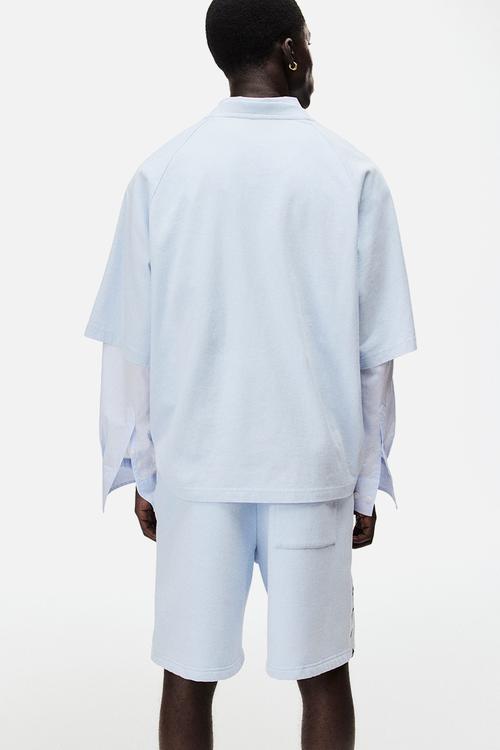 Lotto H&M: Regular fit sweatshorts - light blue/lotto