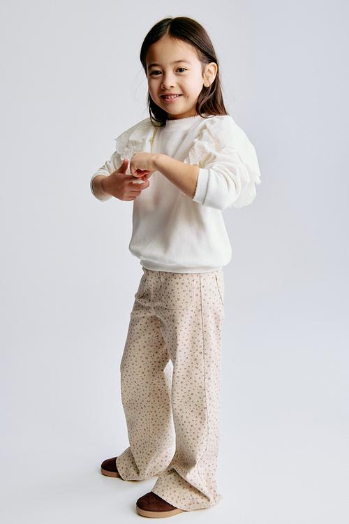 Flared jeans - beige/floral