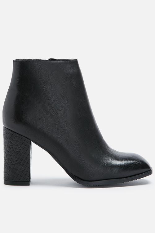 Alpha embossed heel boot