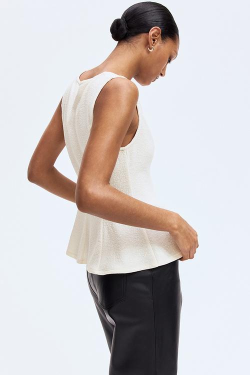 Sleeveless peplum top - cream