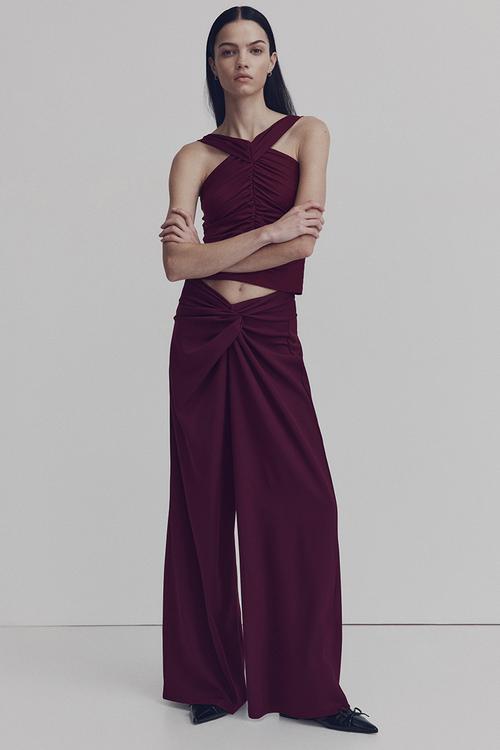 Twisted-detail trousers - plum red