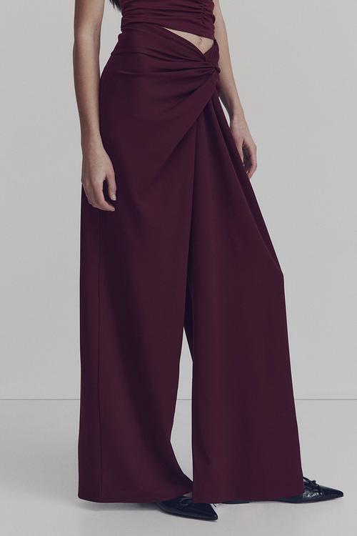 Twisted-detail trousers - plum red