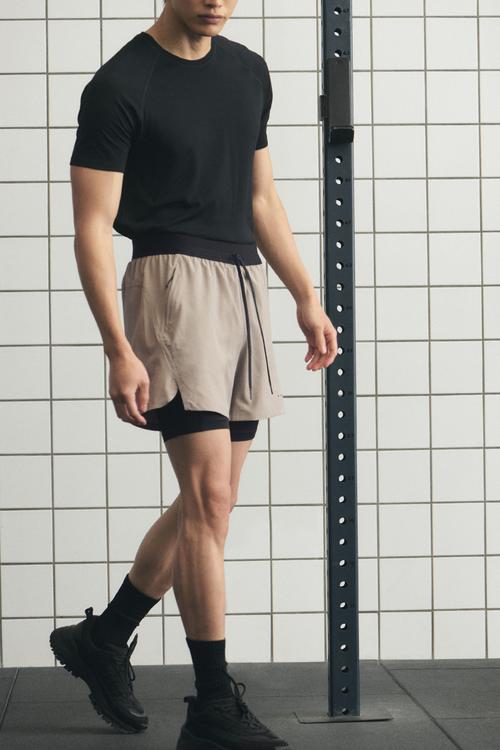 Double-layered sports shorts with drymove™ - beige/black