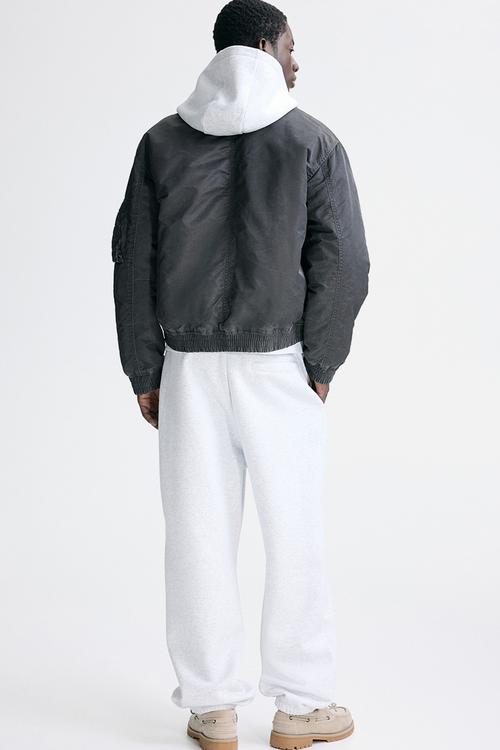 Loose fit sweatpants - light grey marl/fortes fortuna