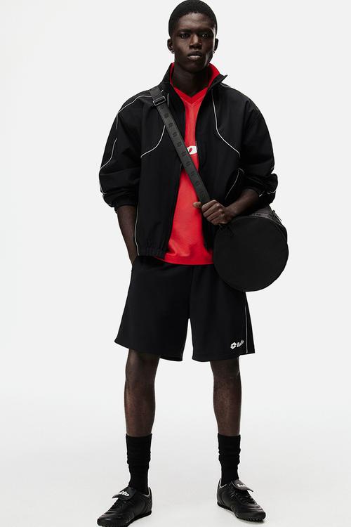 Lotto H&M: Relaxed fit football shorts - black/lotto