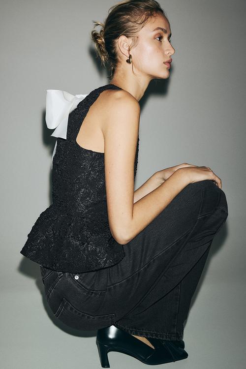 Bow-detail peplum top - black