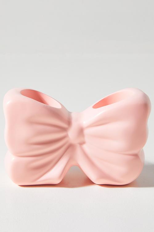 Bow-shaped toothbrush holder - pink