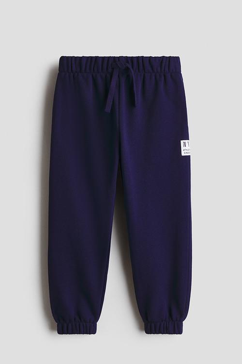 Motif-detail joggers - navy blue/nyc