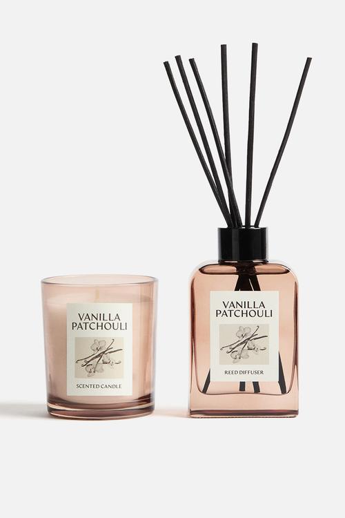 Scented candle in a glass holder - vanilla patchouli