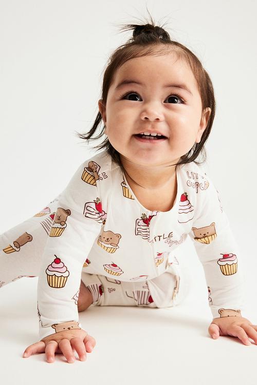 The Long Sleeve Zip Romper - Vanilla/Cupcakes