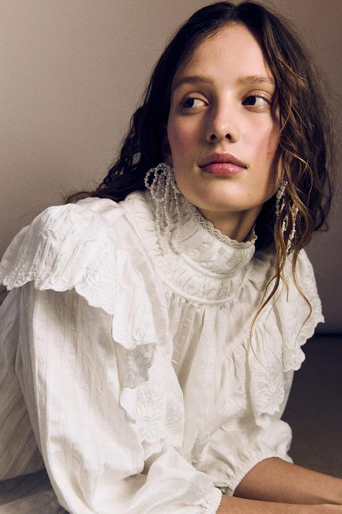 Flounce-trimmed blouse - white