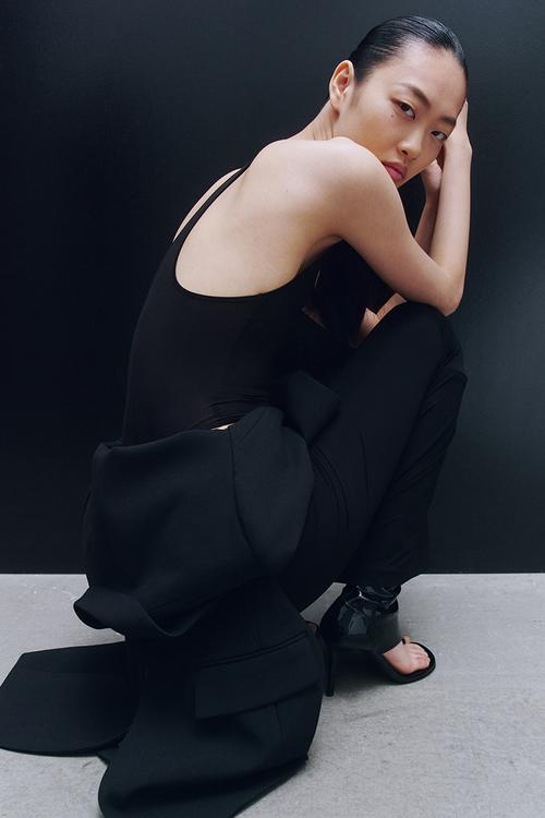 WARDROBE.NYC H&M:  Sheer sleeveless body - black