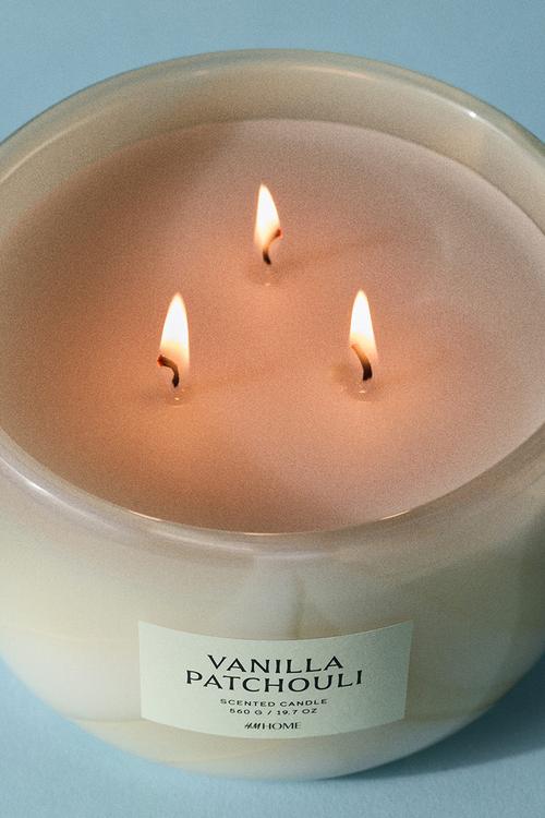 Large scented candle in glass holder - vanilla patchouli