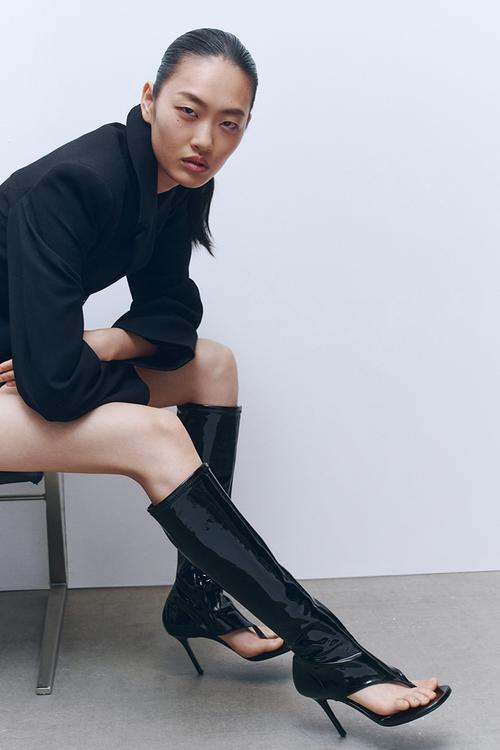 WARDROBE.NYC H&M:  Cut-out leather sock boots - black