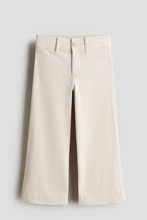 Flared trousers - light beige