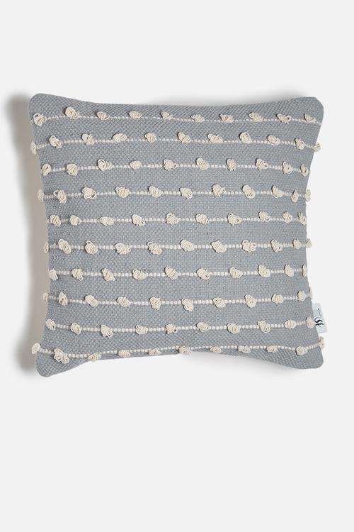 Dotty knotted cushion cover
