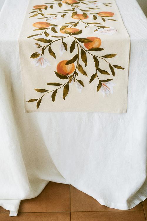 Patterned linen-blend table runner - light beige/oranges