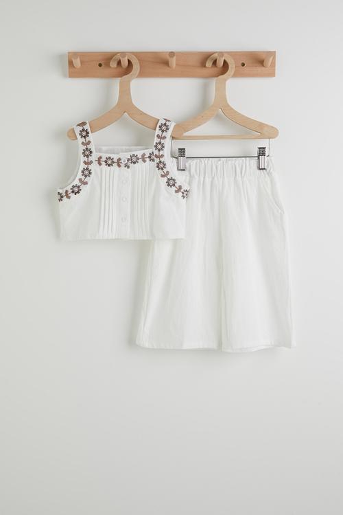Embroidered top and wide leg jeans - white