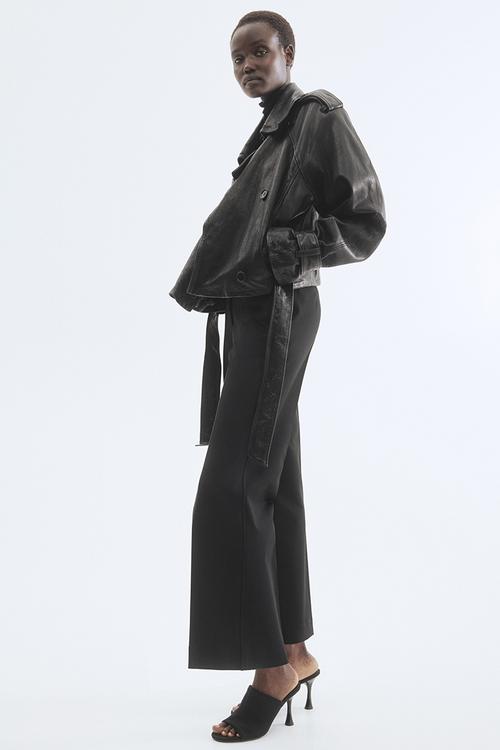 Bootcut ankle-length trousers - black