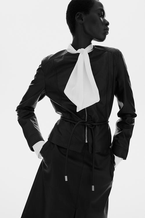 Coated peplum jacket - black