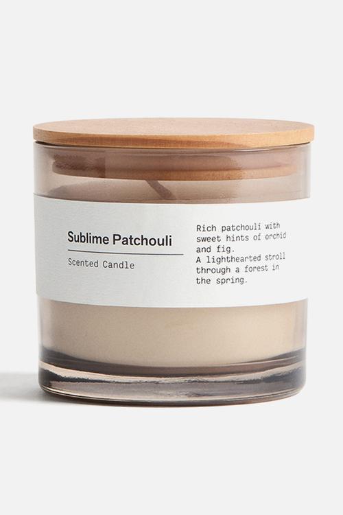 Scented candle in glass holder - sublime patchouli
