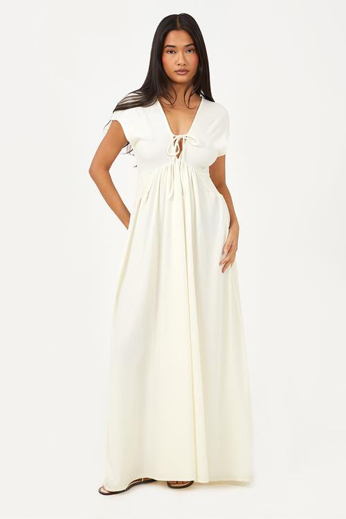 Ladies Sleeveless V Neck Textured Jersey Midi DressWith Ruched Waist And Bow Detail - White