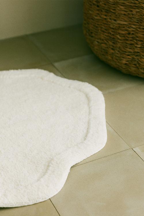 Tufted cotton bath mat - white