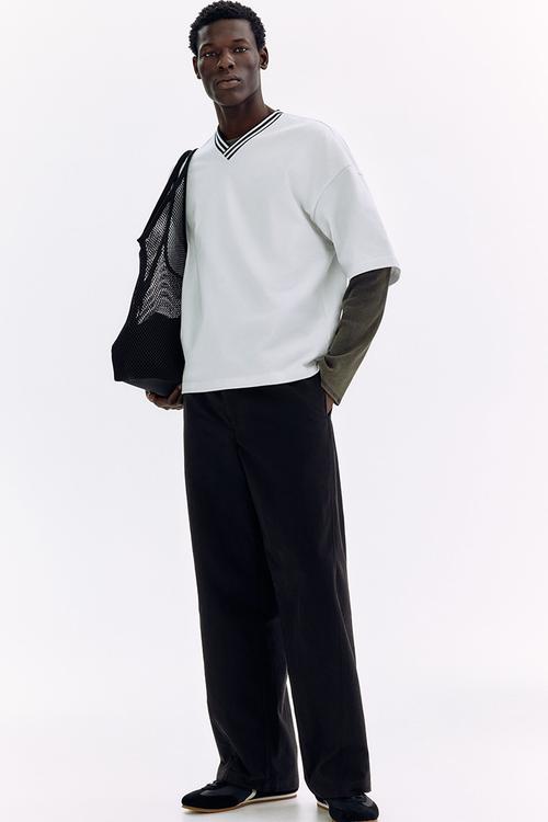 Relaxed fit twisted trousers - black