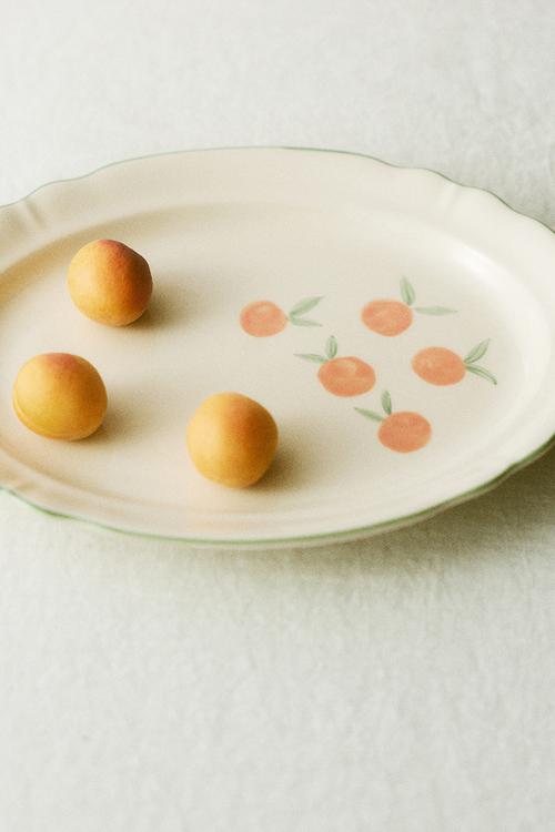 Hand-painted stoneware serving plate - light beige/oranges