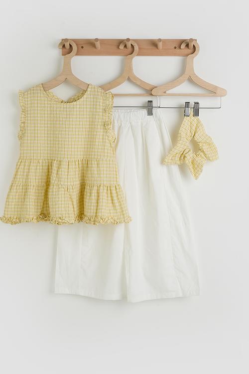 Ruffle hem peplum top & panelled pants - light yellow/white