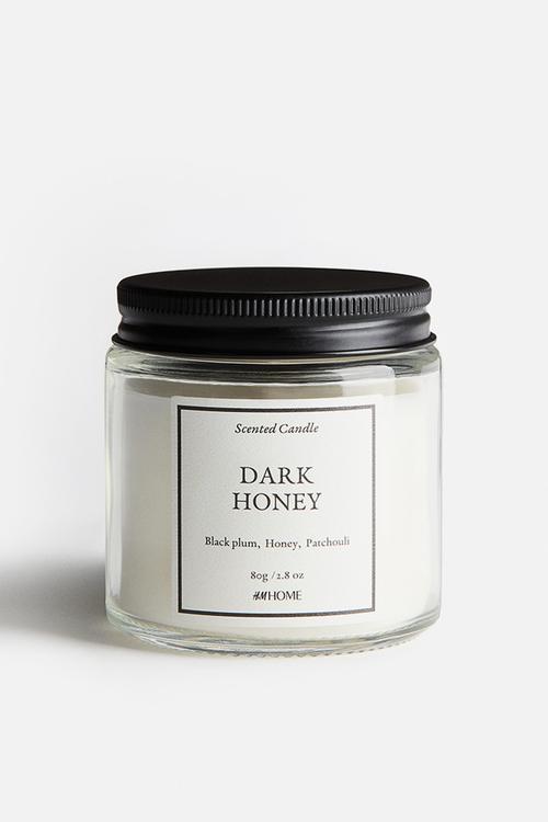 Scented candle in glass holder - dark honey