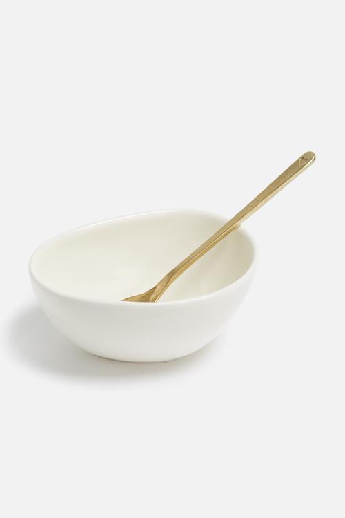 White bowl & gold spoon