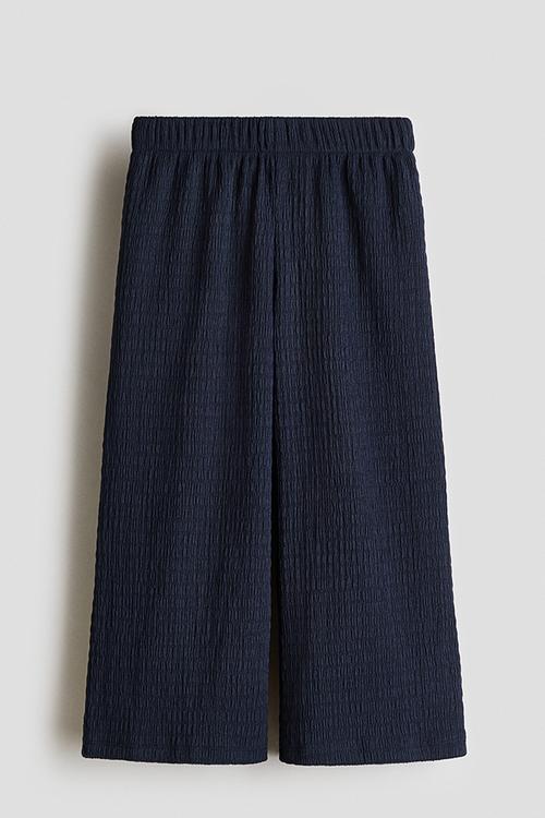 Wide crinkled trousers - navy blue