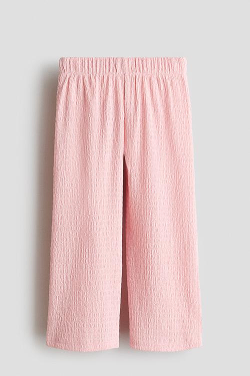 Wide crinkled trousers - light pink