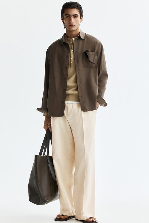 Loose fit wide linen-blend trousers - cream