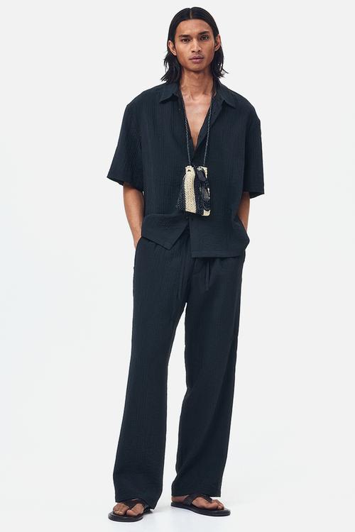 Relaxed fit textured trousers - black