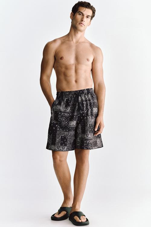 Patterned swim shorts - black/paisley pattern