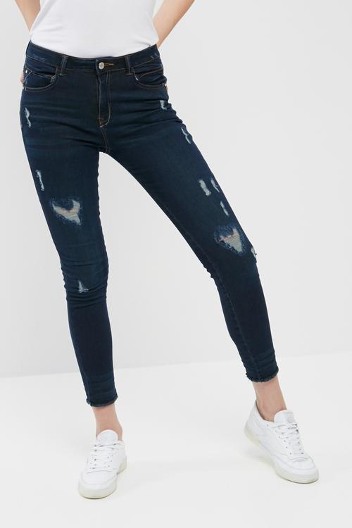 Anarchy mid rise ripped skinny jeans