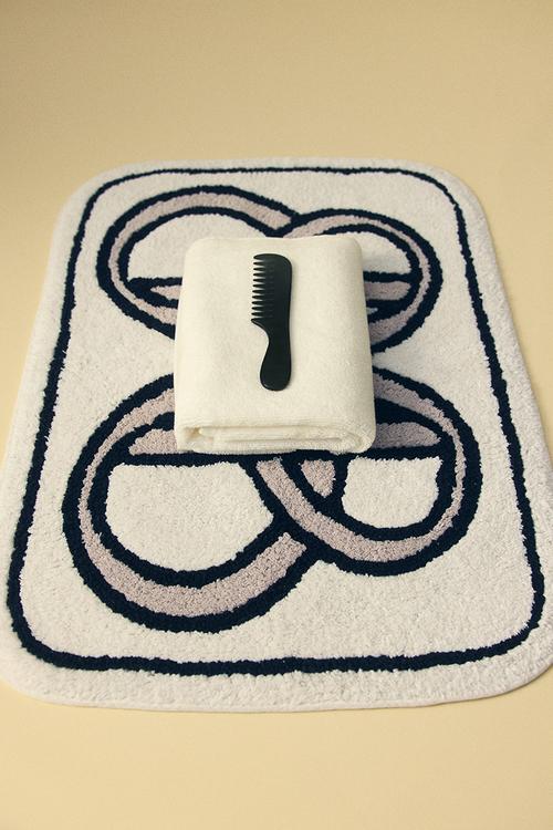 Motif-detail bath mat - white/bm