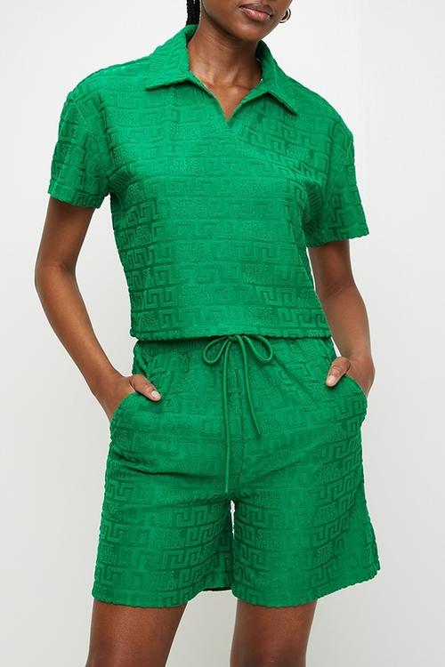 Ladies tessa embossed logo top with collar - emerald green
