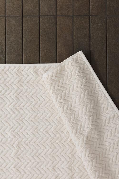 Textured bath mat - cream