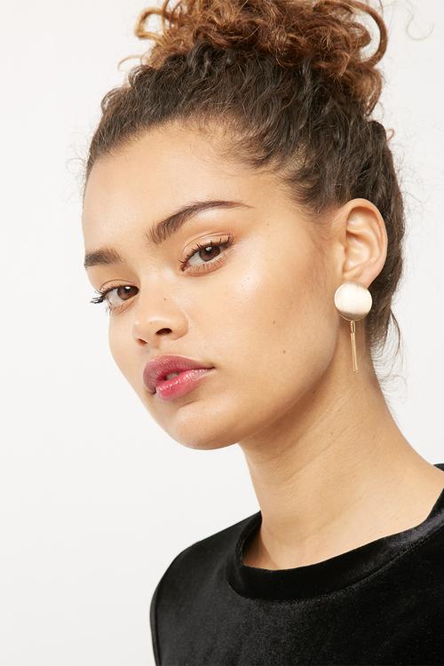 Earring with tassel