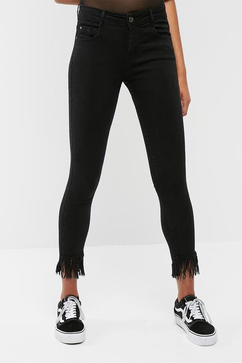 Frayed hem mid rise skinny jeans