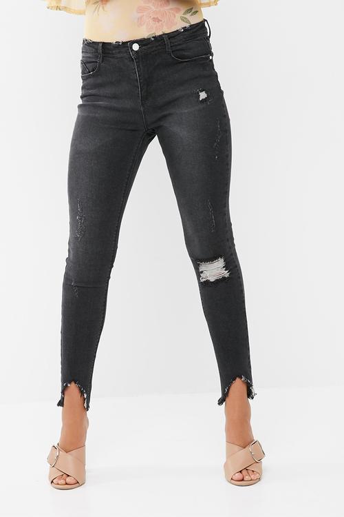 Anarchy mid rise step hem skinny jeans
