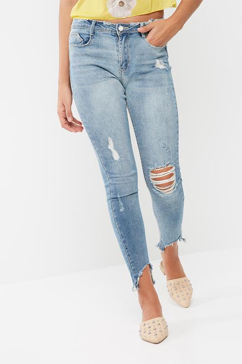 Anarchy mid rise step hem skinny jeans